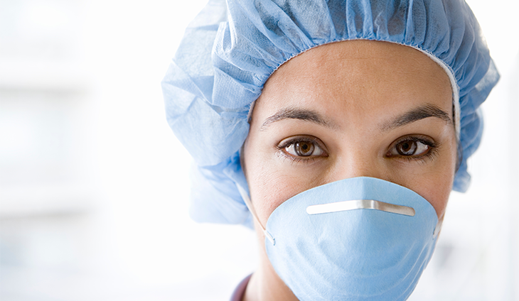 Woman with cap and coronavirus mask