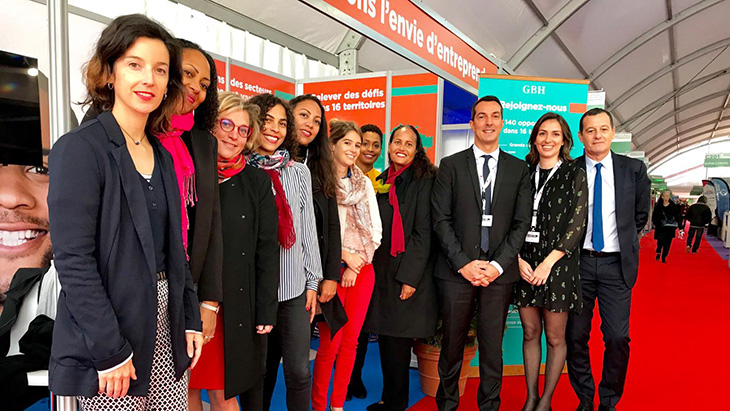 HR directors and managers team in the French Overseas pavilion at the Paris employment fair