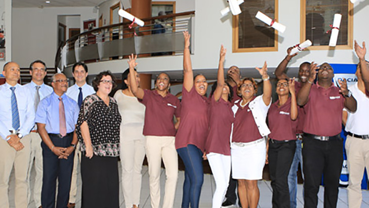 Ten winners of the Martinique Automobiles training center's workshop receptionist course
